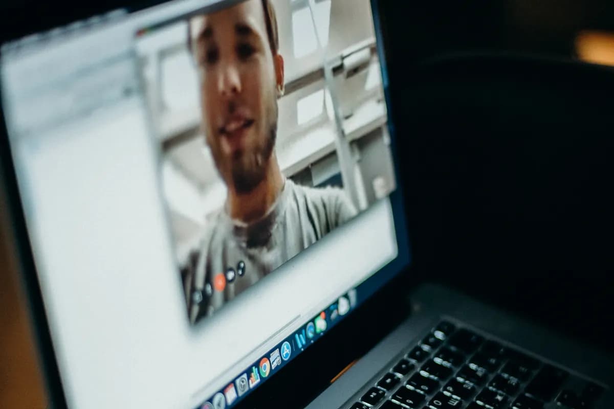 Person on a video call on a laptop while testing the best Omegle alternatives in 2026